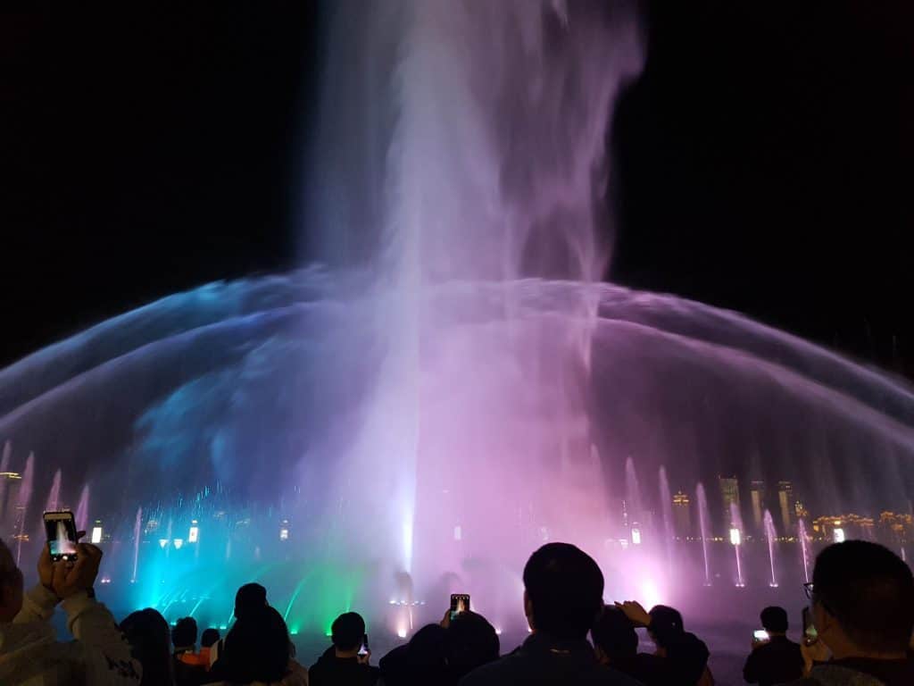 water fountain with colored lights projected on it - nanchang china