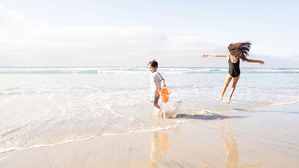 Things to Do with Kids in Siesta Key, Florida - The Beach with excited kids